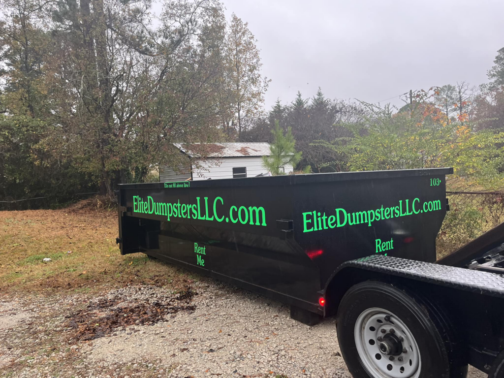 13-yard roll-off dumpster positioned for a residential home renovation and construction debris removal.